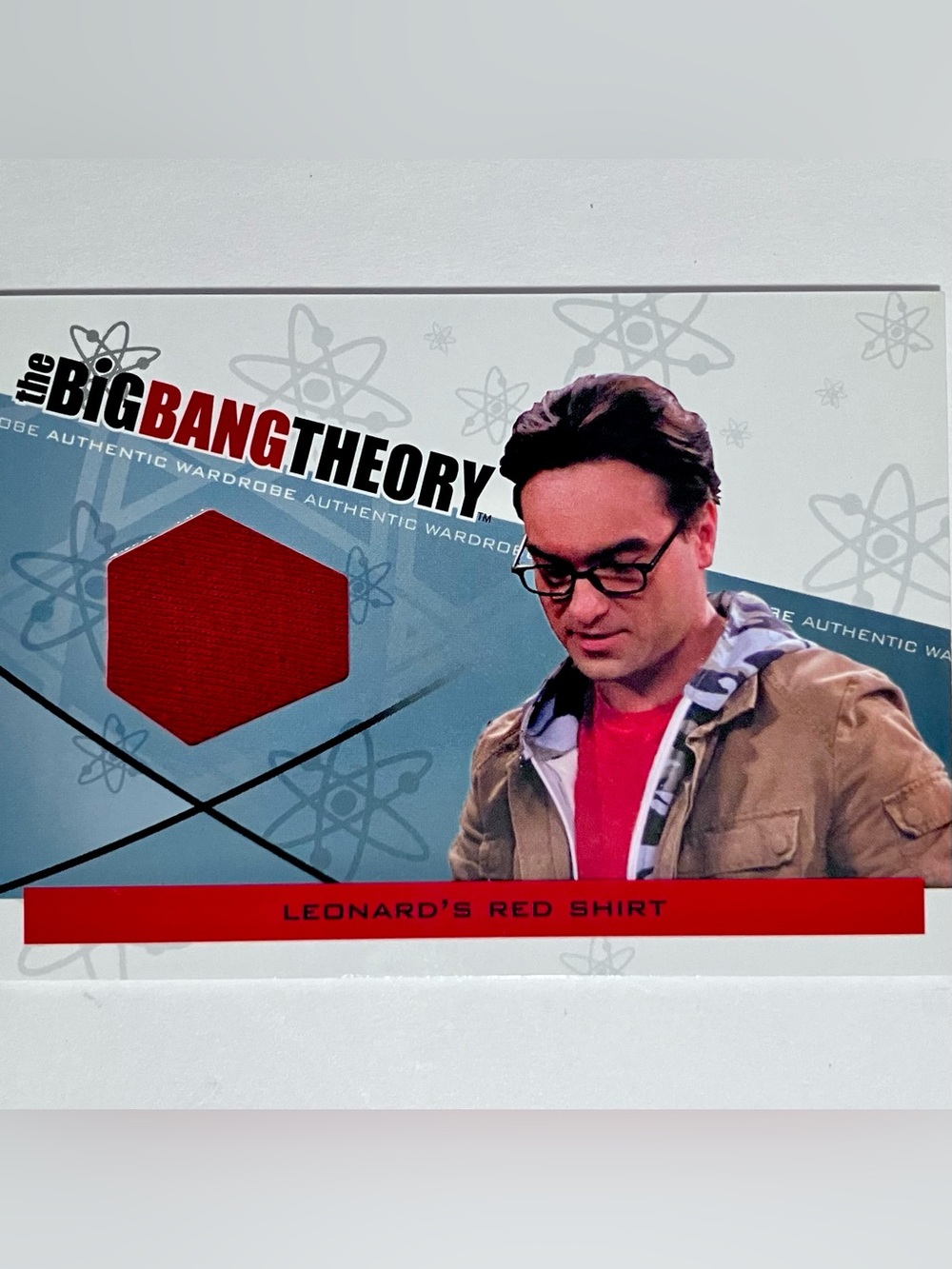BIG BANG THEORY COSTUME CARD M-24 / A Piece Of RED SHIRT Worn By JOHNNY GALECKI